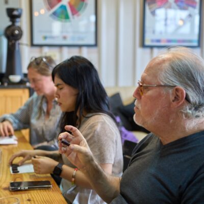 Guests tasting Quetzal Cacao chocolate during a guided cacao and coffee tasting in Panama